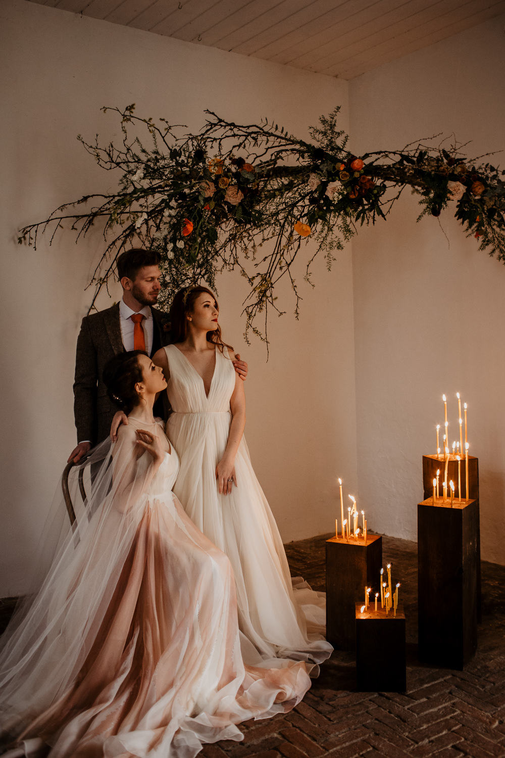Elopement Wedding Ideas Oilvejoy Photography Branch Installation Flowers Wild Natural Orange Rose Autumn Fall Candles Backdrop Floral