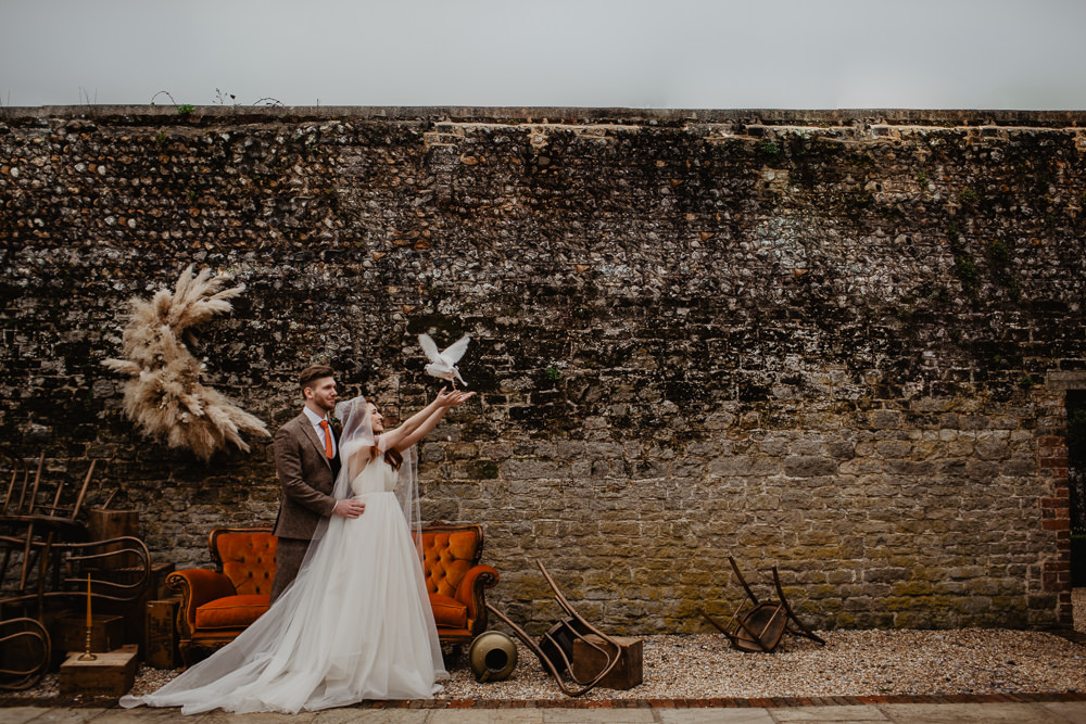 Elopement Wedding Ideas Oilvejoy Photography Crescent Moon Pampas Grass Installation Backdrop Flowers Floral Orange Sofa Vintage