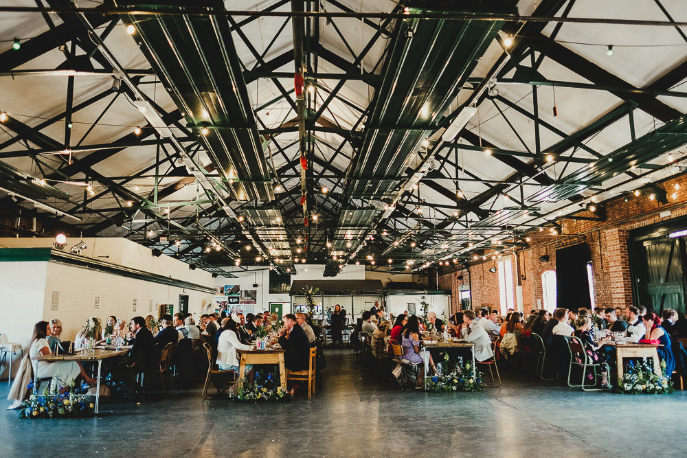 Warehouse Venue Festoon Lights Long Tables School Chairs Elsecar Heritage Centre Wedding Ayesha Photography
