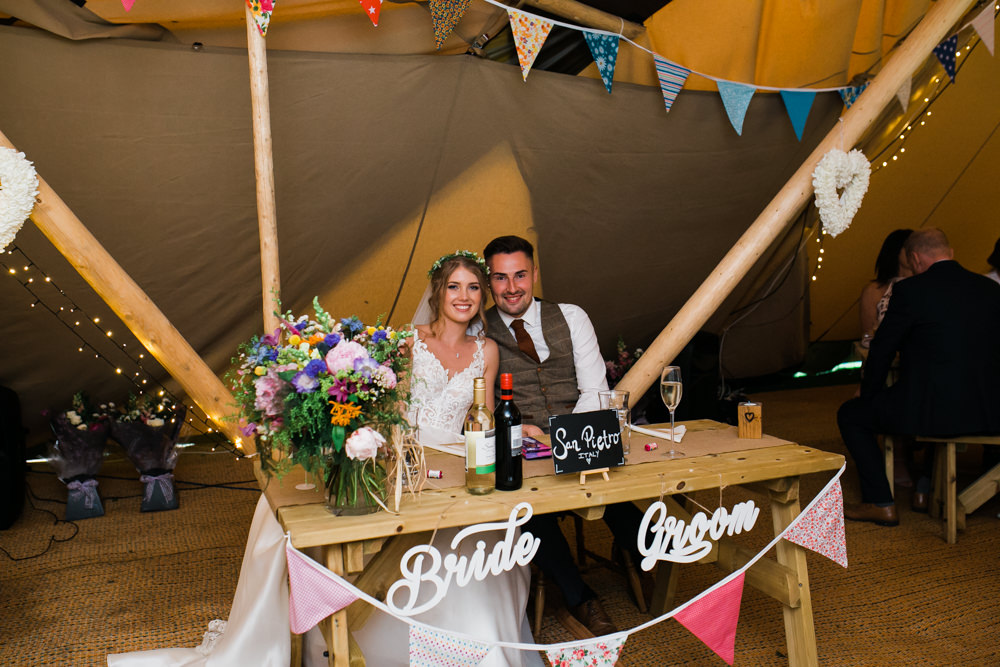 Bride Bridal V Neck A Line Dress Gown Lace Edged Veil Flower Crown Tweed Suit Groom Waistcoat Sweetheart Table Bunting Lincolnshire Tipi Wedding Jessy Jones Photography