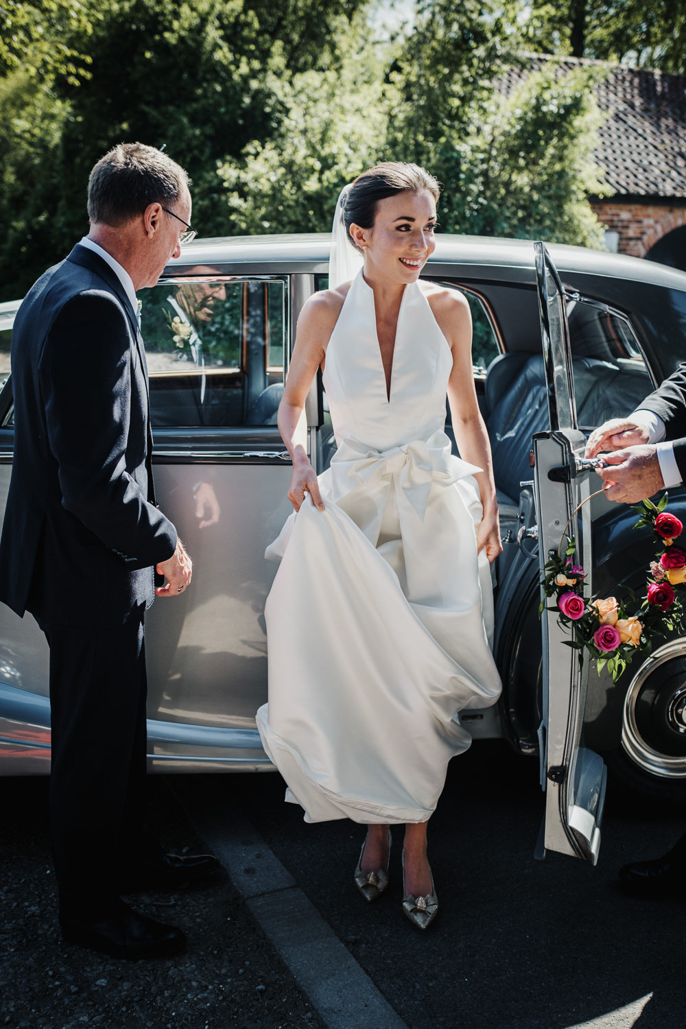 Bride Bridal Halterneck Collar Dress Gown Pockets Bow Jesus Peiro Middlethorpe Hall Wedding Andy Withey Photography