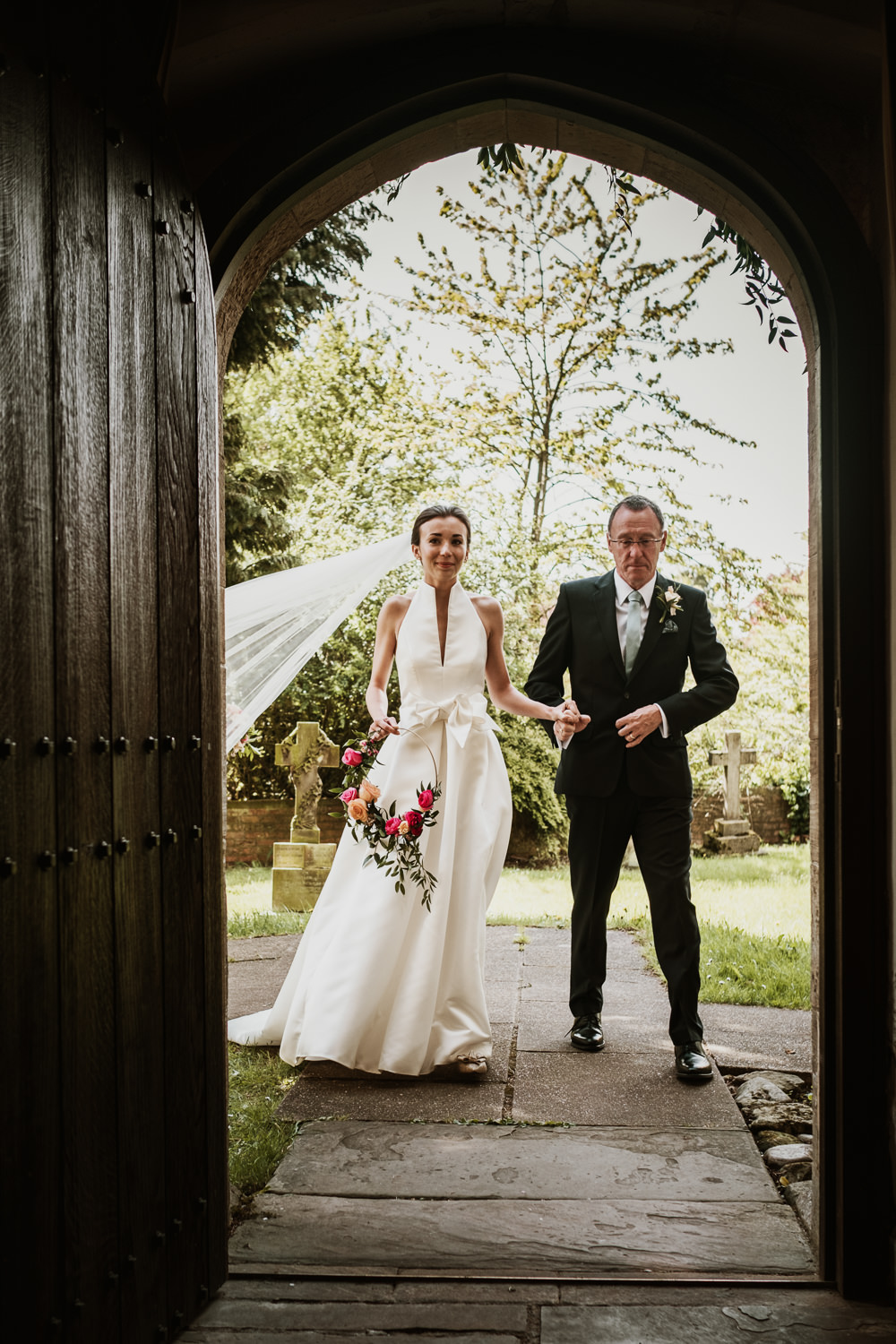 Bride Bridal Halterneck Collar Dress Gown Pockets Bow Jesus Peiro Floral Hoop Veil Middlethorpe Hall Wedding Andy Withey Photography
