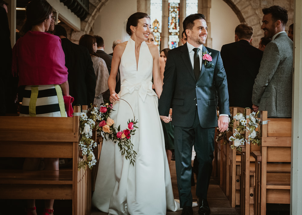 Bride Bridal Halterneck Collar Dress Gown Pockets Bow Jesus Peiro Navy Suit Groom Floral Hoop Middlethorpe Hall Wedding Andy Withey Photography
