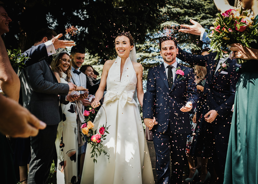Bride Bridal Halterneck Collar Dress Gown Pockets Bow Jesus Peiro Navy Suit Groom Confetti Floral Hoop Middlethorpe Hall Wedding Andy Withey Photography