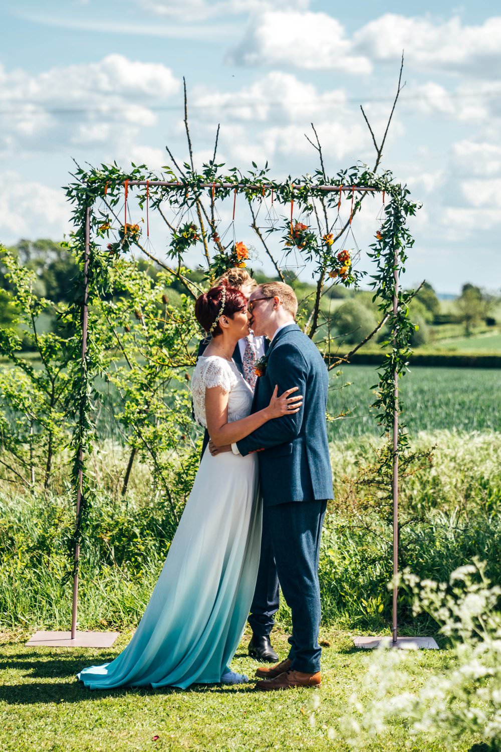 Ceremony Aisle Frame Arch Backdrop Greenery Foliage Flowers Outdoor DIY Wedding Three Flowers Photography
