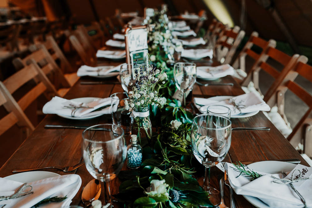 Long Wooden Tables Rustic Chairs Greenery Foliage Runner Swag Village Tipi Wedding Ryan Goold Photography