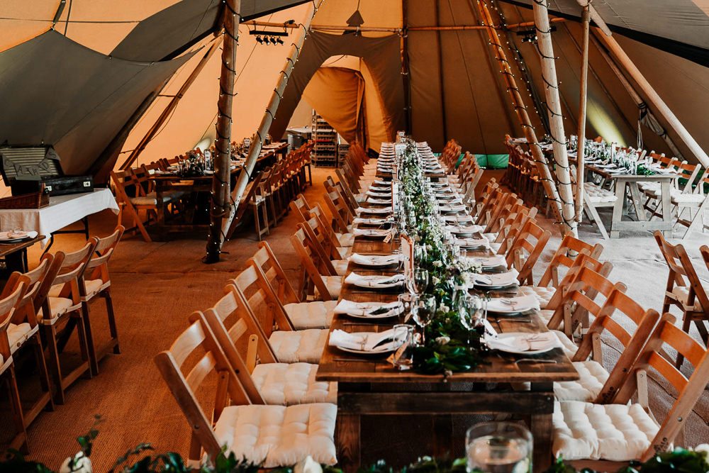 Long Wooden Tables Rustic Chairs Greenery Foliage Runner Swag Village Tipi Wedding Ryan Goold Photography