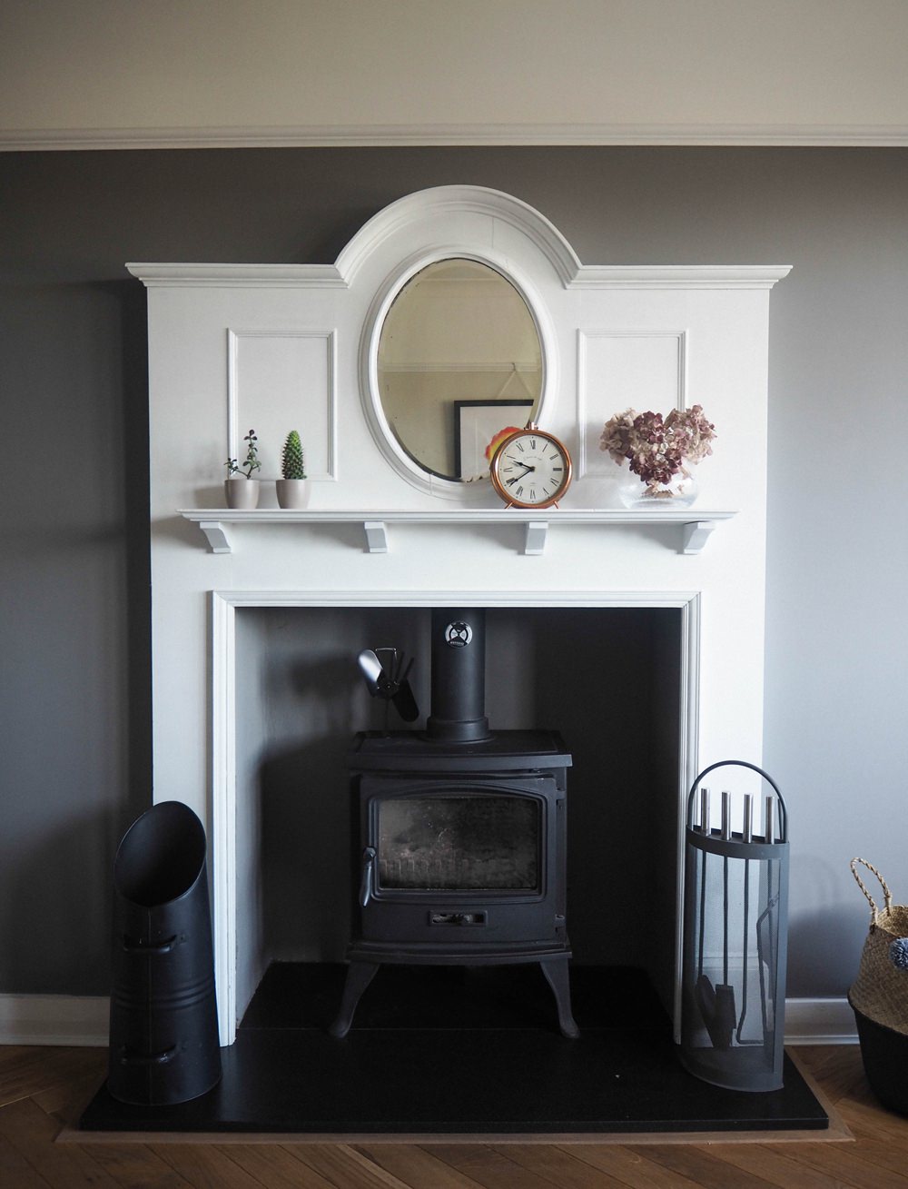 1930s House Living Room Renovation Art Deco Fireplace Mantle Mirror Oval White Log Burner Farrow & Ball Mole's Breath Herringbone Parquet Floor