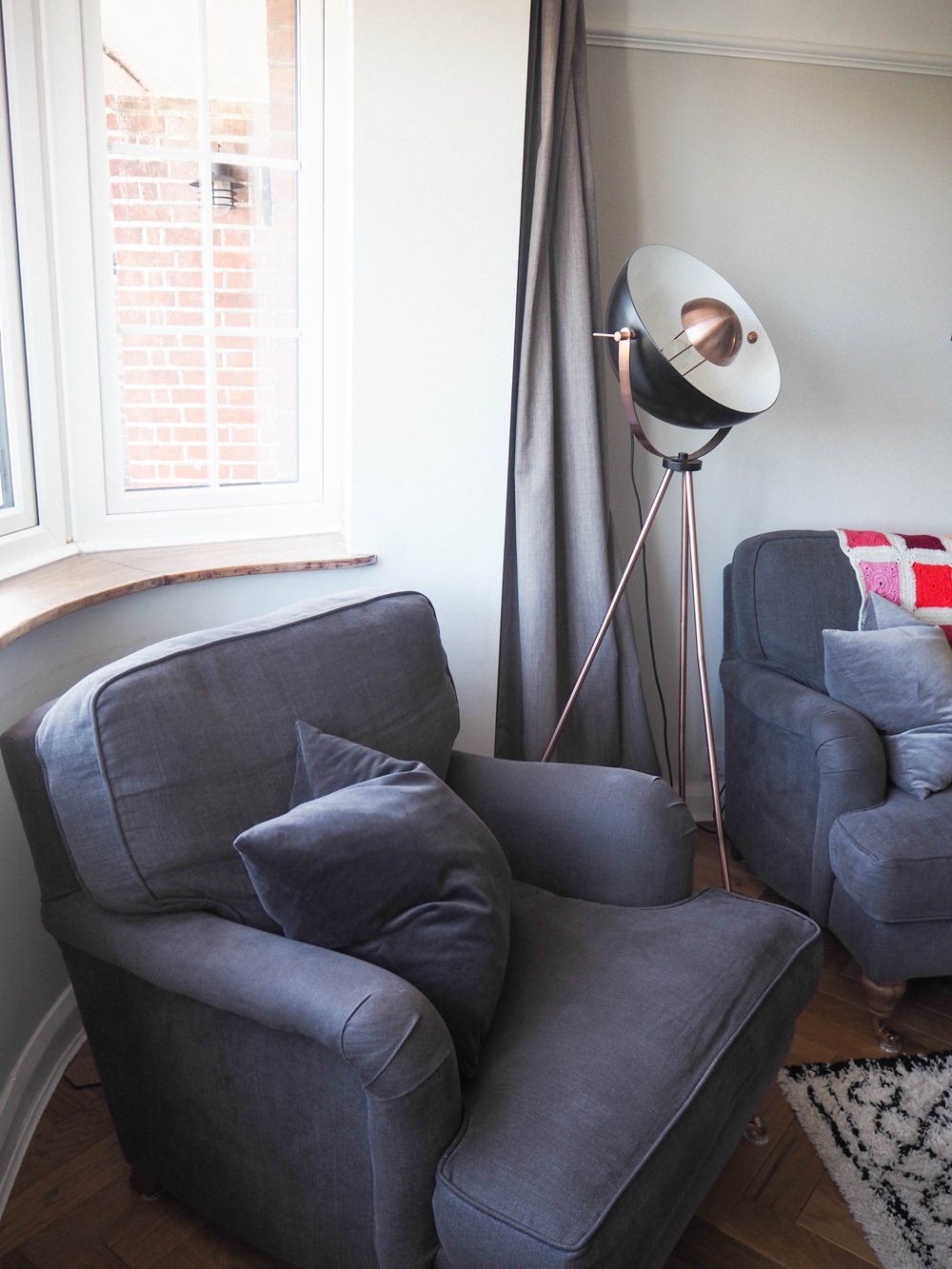 1930s House Living Room Renovation Grey Armchair Bluebell Sofa.com Velvet Cushion Floorlamp Bay Window Curtains