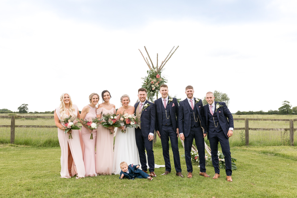 Bride Bridal Dress Gown Sweetheart Neckline Three Piece Suit Tweed Waistcoat Groom Veil Mismatched Pink Bridesmaids Botanical Barn Wedding Heather Jackson Photography