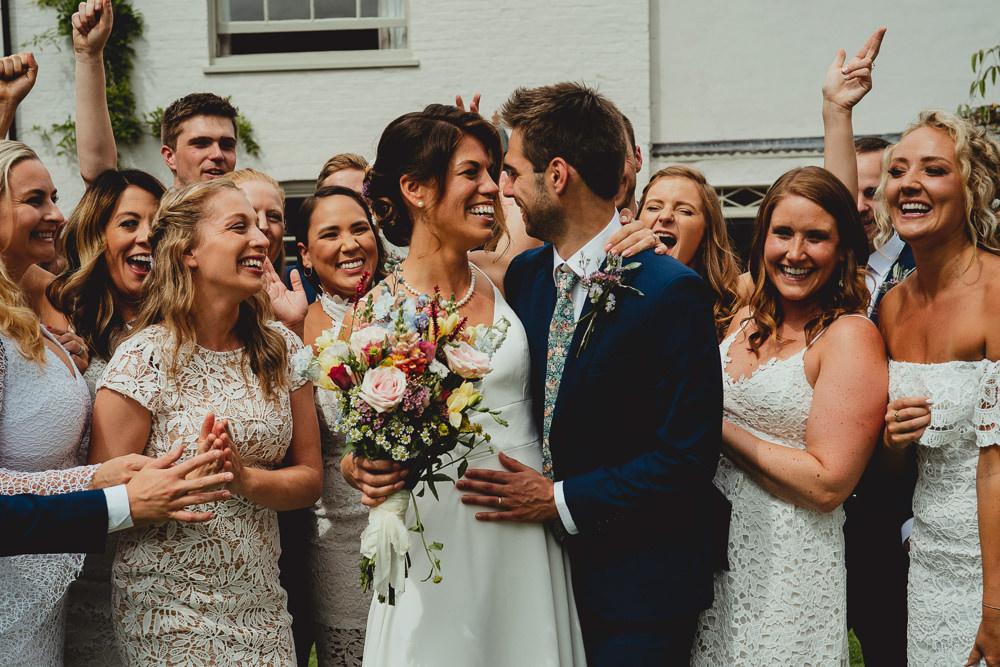 Bride Bridal Strappy Sleeveless Lace V Neck Dress Gown Groom Liberty Print Tie Wildflower Bouquet White Lace Bridesmaids British Countryside Wedding Georgia Rachael Photography