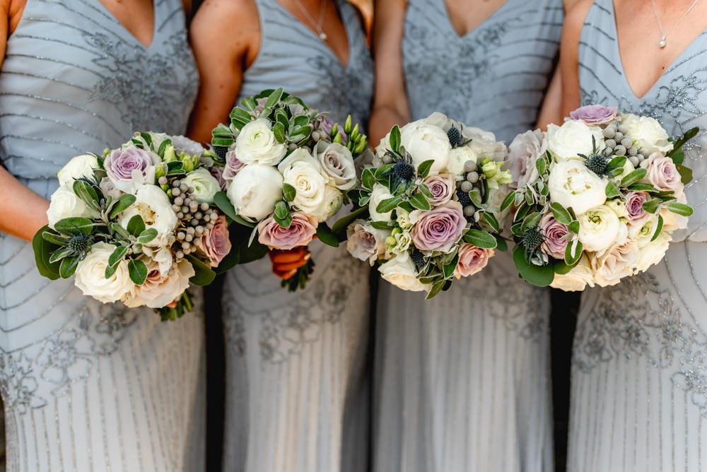 Bridesmaids Bouquets Tight Posy Rose Sea Holly Greenery Cotswolds Barn Wedding Lisa Carpenter Photography
