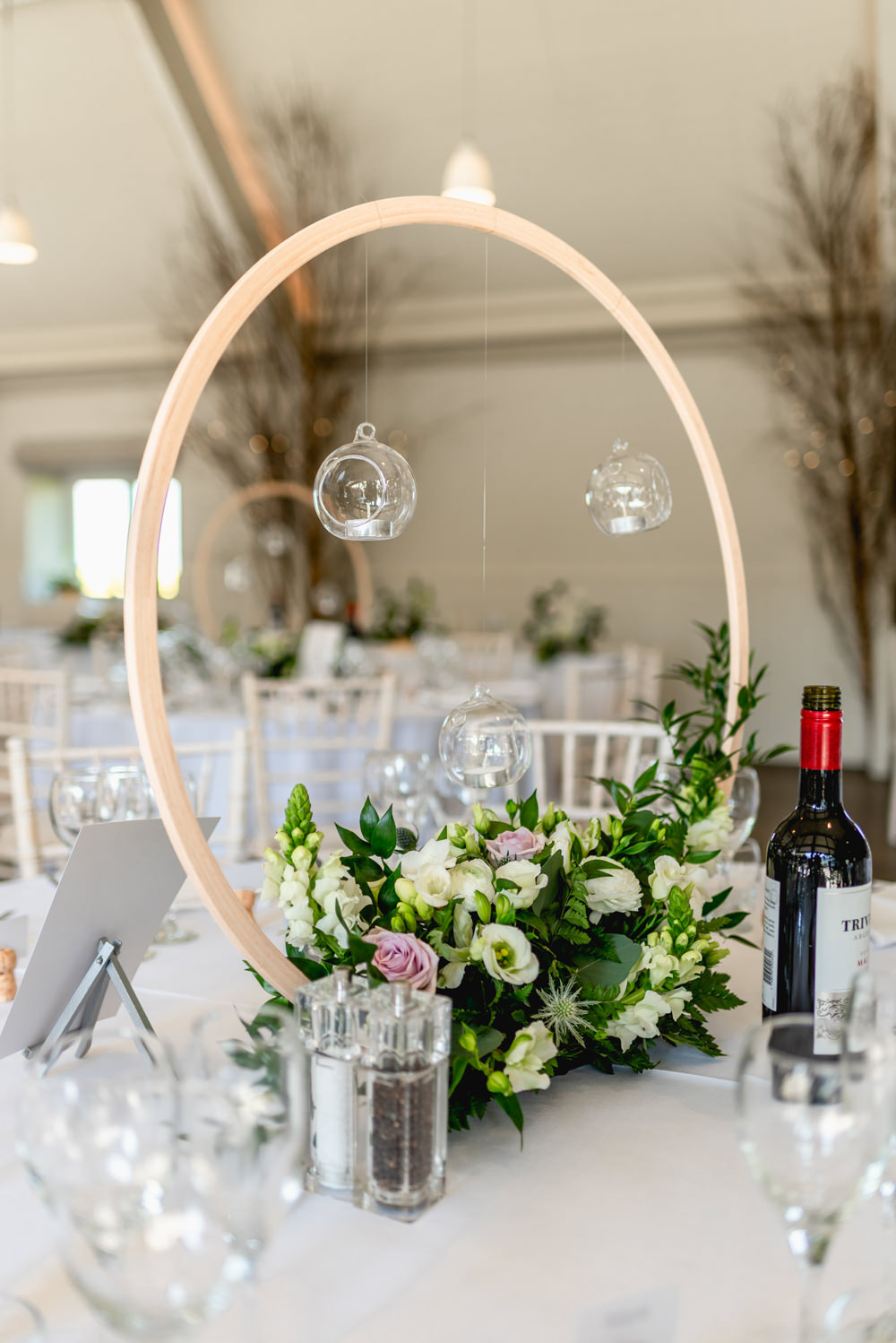 Hoop Hanging Tea Lights Greenery Flowers Floral Table Centre Cotswolds Barn Wedding Lisa Carpenter Photography