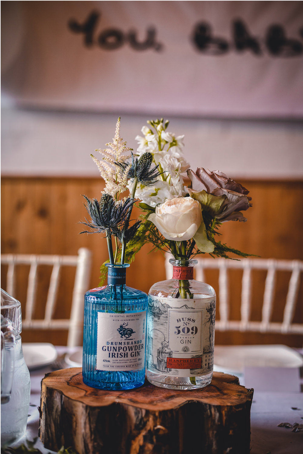 Gin Bottle Vase Flowers Floral Log Wood Slice Table Decor DIY Bohemian Wedding Love & Bloom Photography