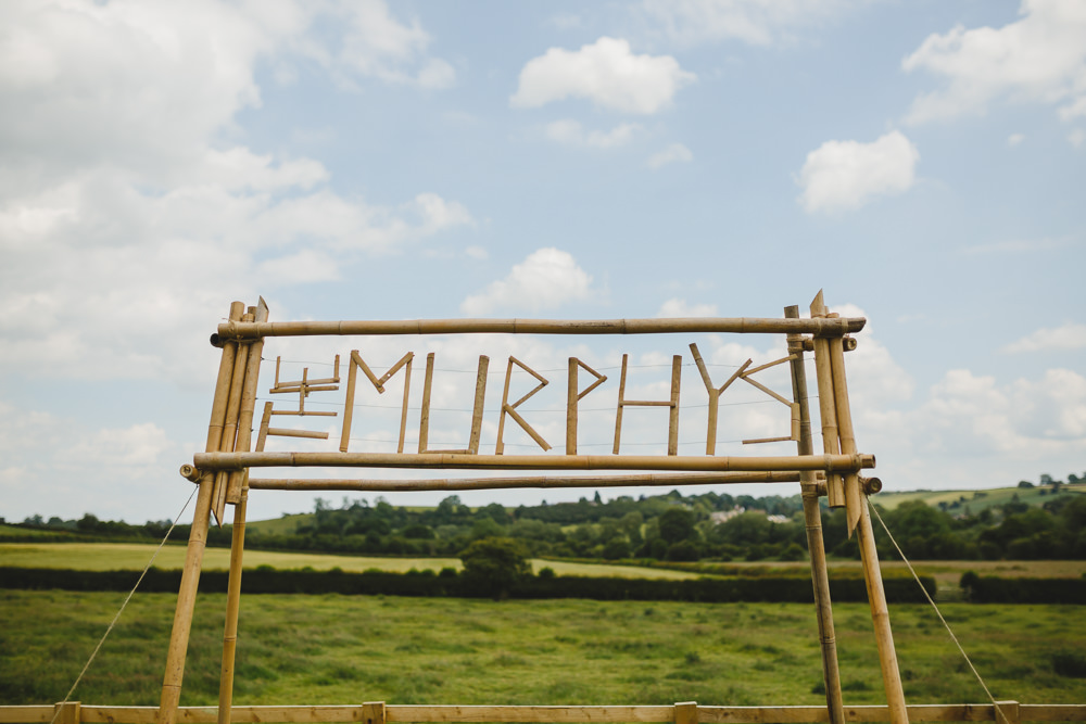 Wes Anderson Inspired Camp Sign Ceremony Backdrop East Keswick Village Hall Wedding James & Lianne Wedding Photography