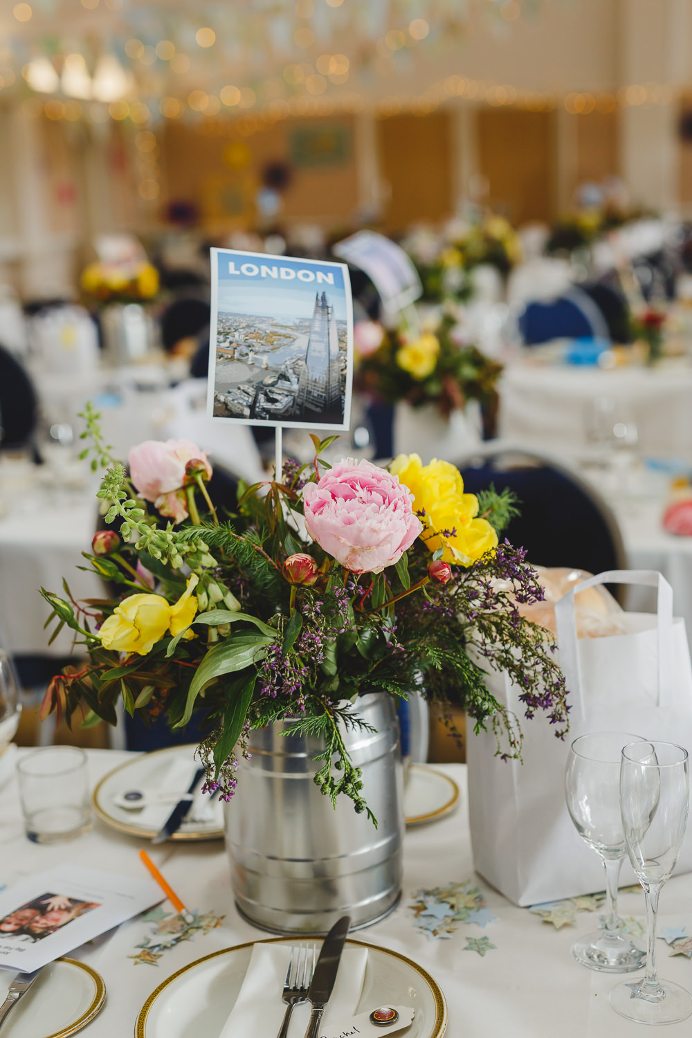 Table Name London Postcard Floral Table Centre Miniature Barrel East Keswick Village Hall Wedding James & Lianne Wedding Photography