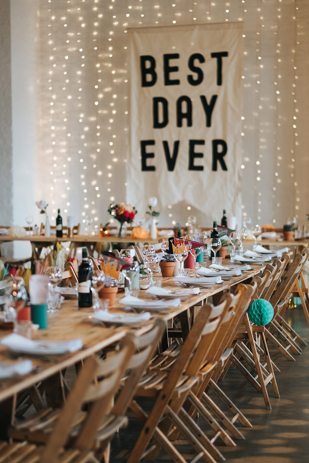 Warehouse Venue Decor Decoration Festoon Lights Sign Banner Backdrop Fairy Light Curtain Trestle Tables Fun London Wedding Miss Gen Photography