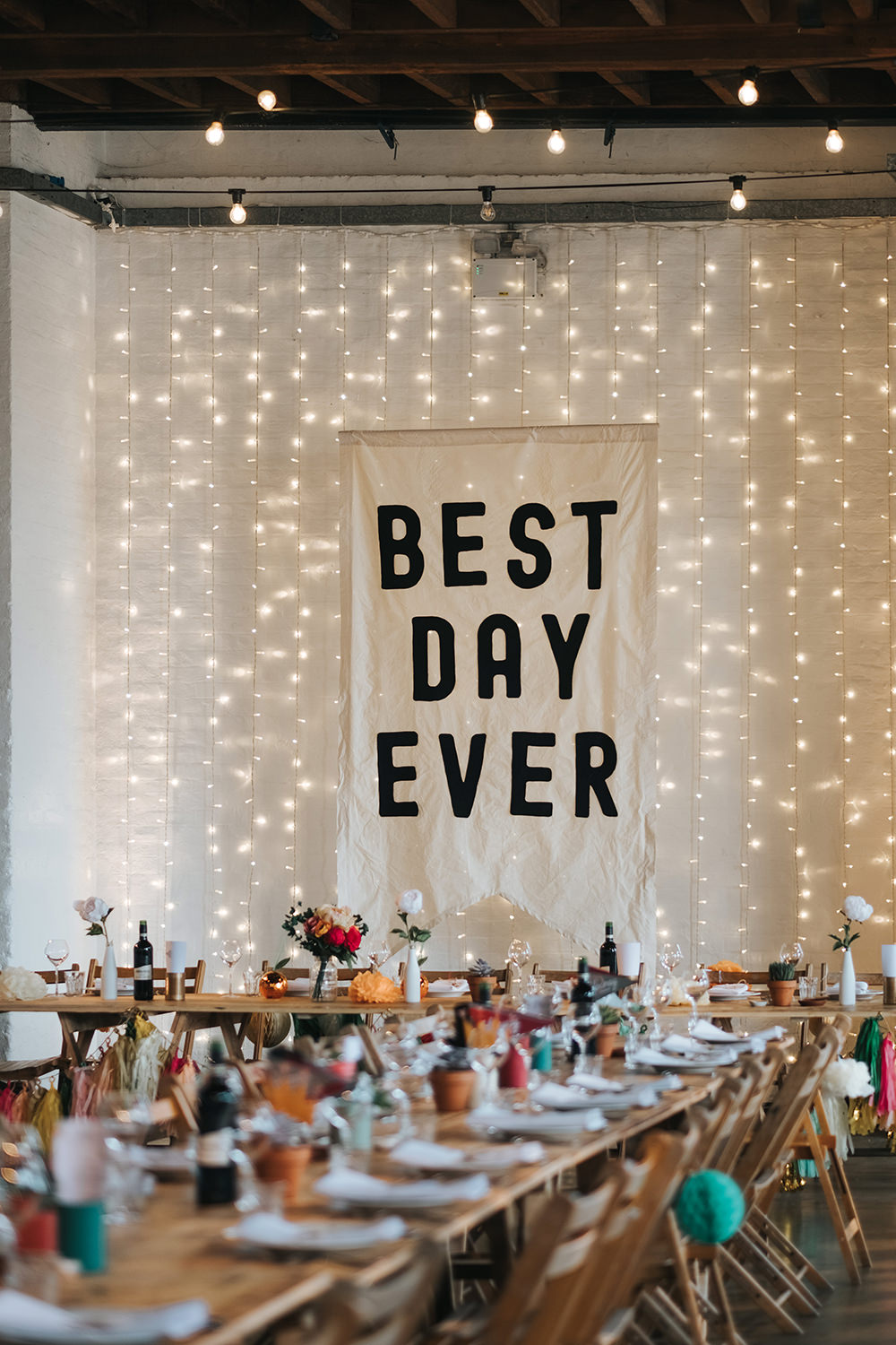 Warehouse Venue Decor Decoration Festoon Lights Sign Banner Backdrop Fairy Light Curtain Trestle Tables Fun London Wedding Miss Gen Photography