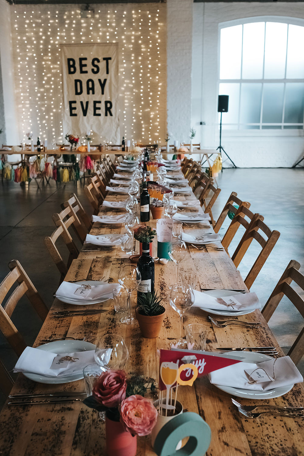 Warehouse Venue Decor Decoration Festoon Lights Sign Banner Backdrop Fairy Light Curtain Trestle Tables Fun London Wedding Miss Gen Photography
