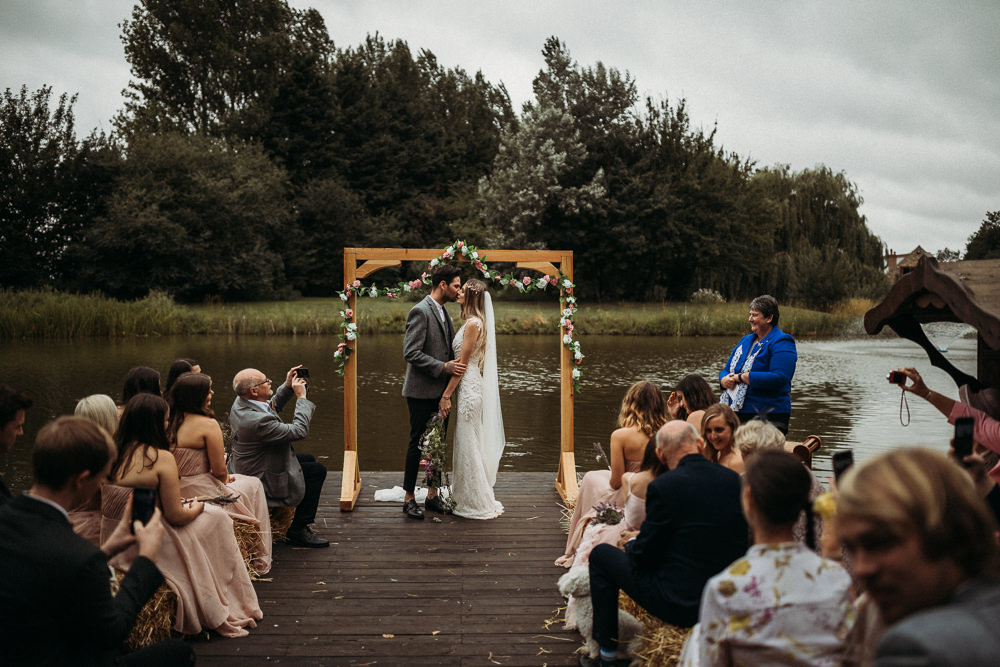 Outdoor Ceremony Wooden Frame Arch Backdrop Flowers Horsley Hale Farm Wedding Thyme Lane Photography