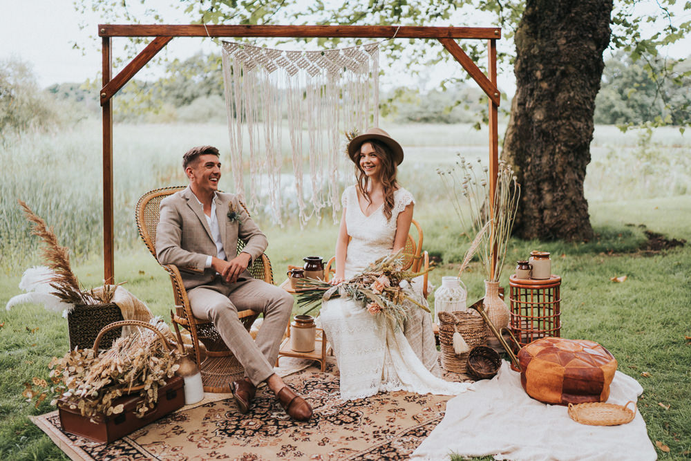 Peacock Chair Macrame Decor Backdrop Frame Pampas Grass Persian Rug Naked Tipi Wedding Ideas Holly Rose Stones