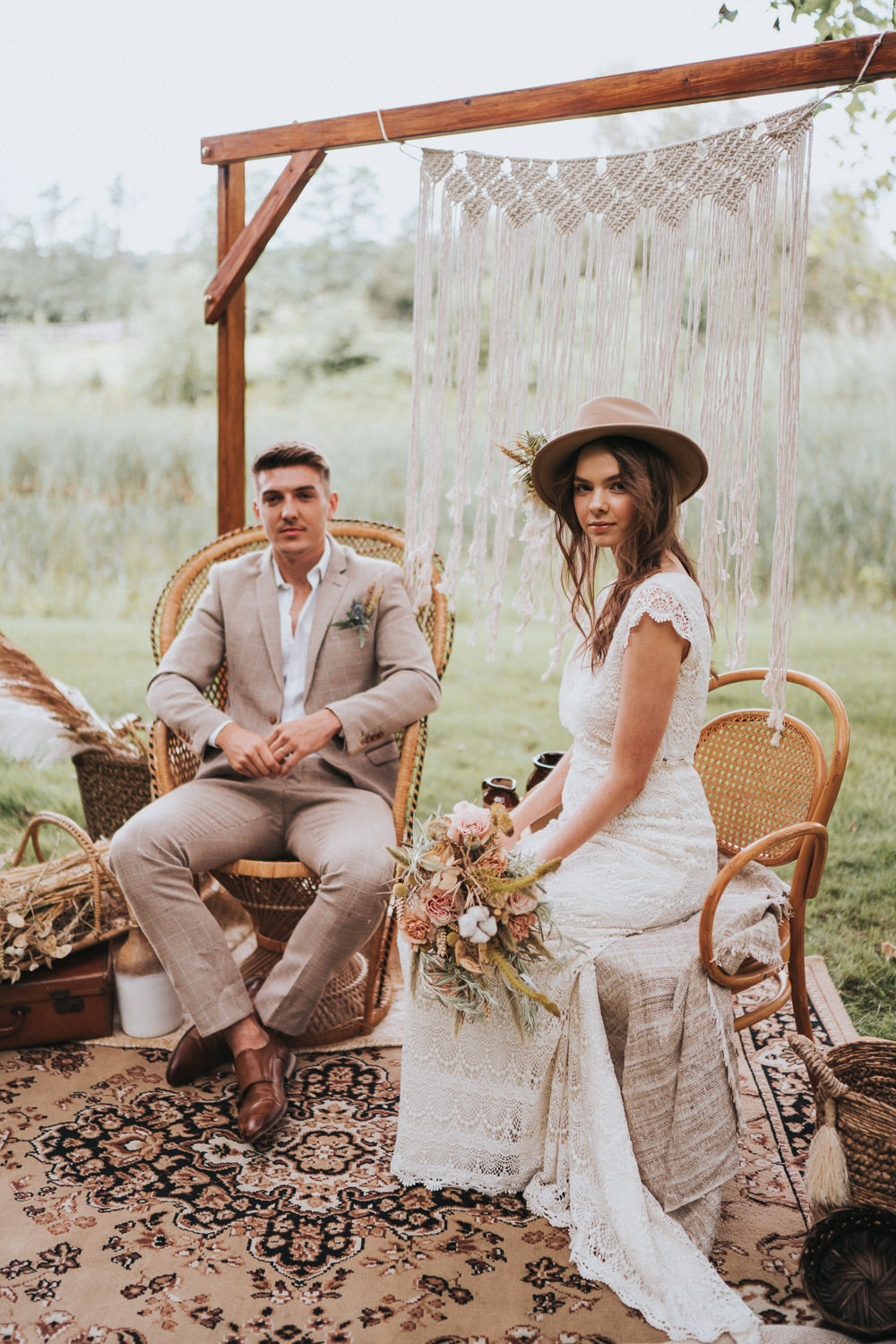 Peacock Chair Macrame Decor Backdrop Frame Pampas Grass Persian Rug Naked Tipi Wedding Ideas Holly Rose Stones