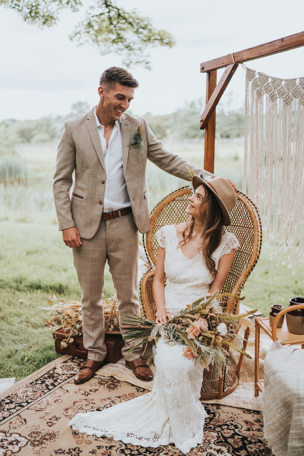 Peacock Chair Macrame Decor Backdrop Frame Pampas Grass Persian Rug Naked Tipi Wedding Ideas Holly Rose Stones
