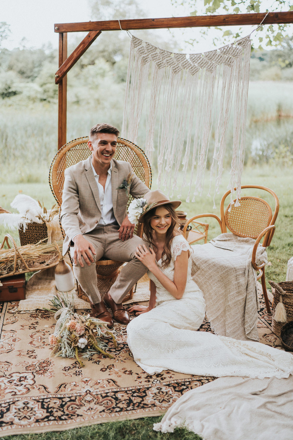 Peacock Chair Macrame Decor Backdrop Frame Pampas Grass Persian Rug Naked Tipi Wedding Ideas Holly Rose Stones