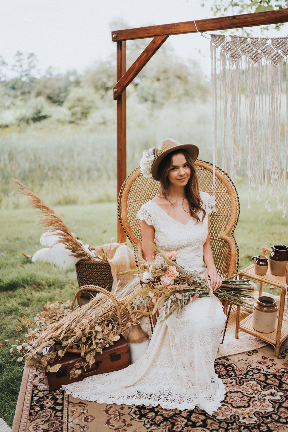 Peacock Chair Macrame Decor Backdrop Frame Pampas Grass Persian Rug Naked Tipi Wedding Ideas Holly Rose Stones