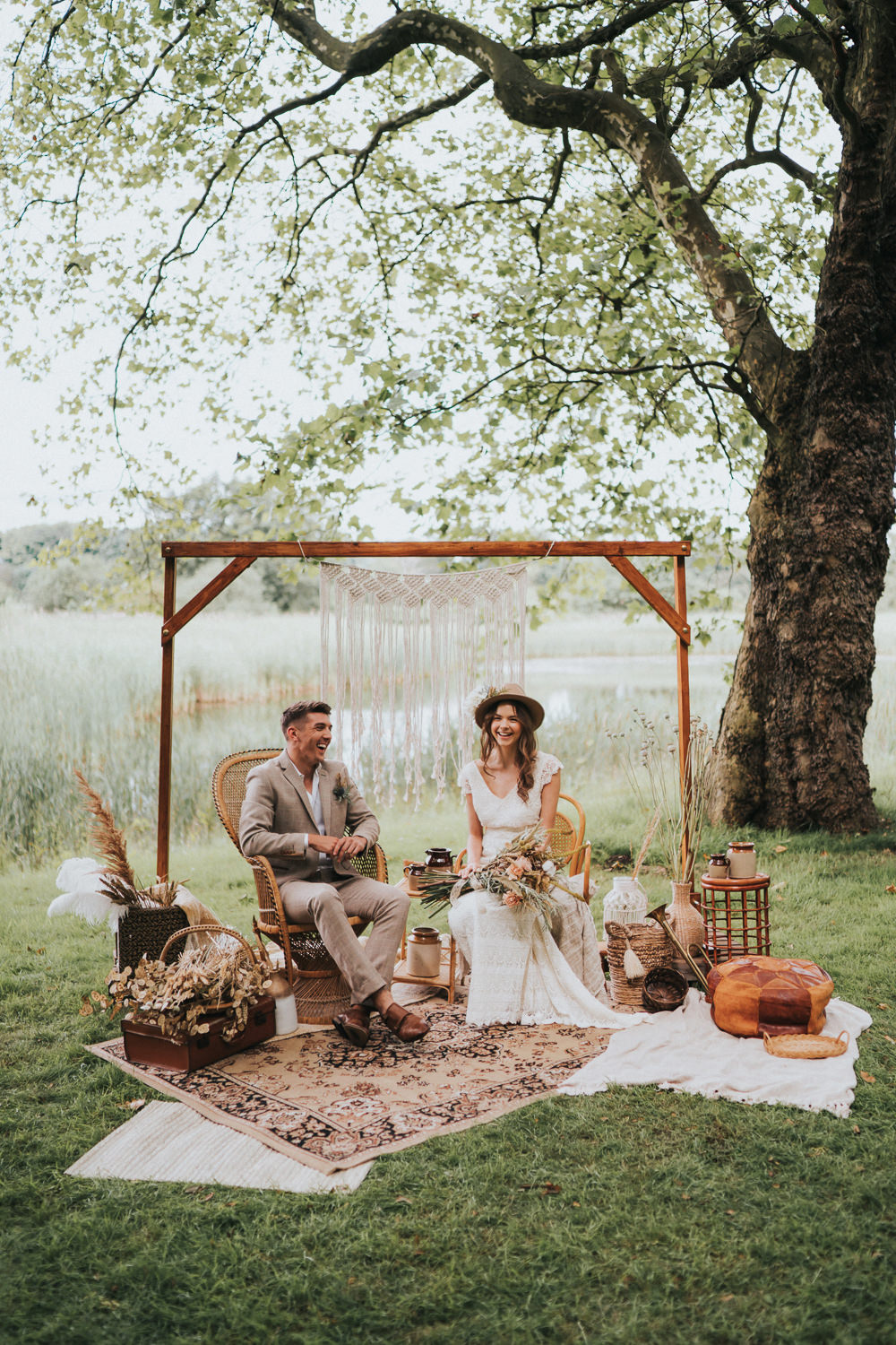 Peacock Chair Macrame Decor Backdrop Frame Pampas Grass Persian Rug Naked Tipi Wedding Ideas Holly Rose Stones
