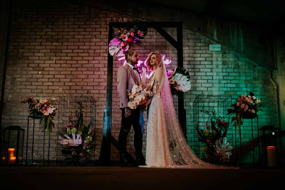Backdrop Arch Flowers Neon Sign Wedding Ideas State Of Love and Trust Photography