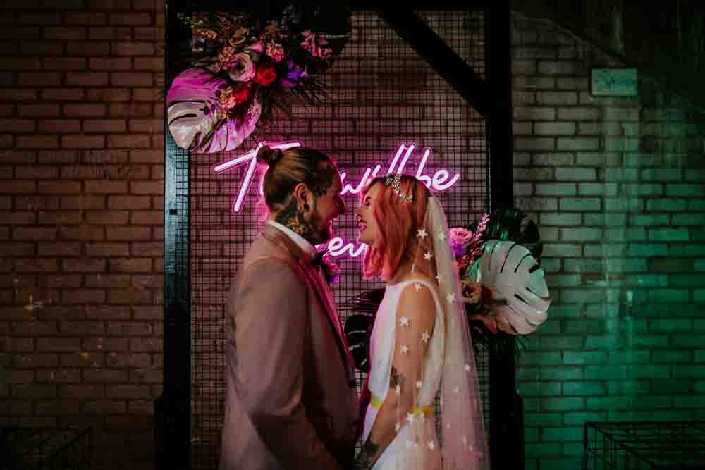 Backdrop Arch Flowers Neon Sign Wedding Ideas State Of Love and Trust Photography