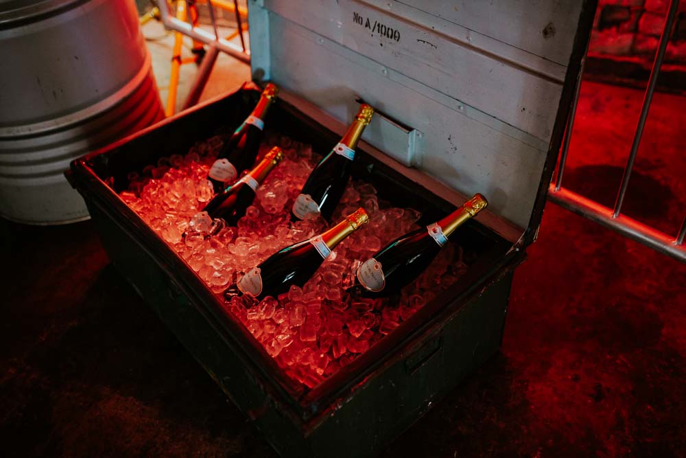 Crate Suitcase Chest Drinks Bottles Neon Sign Wedding Ideas State Of Love and Trust Photography