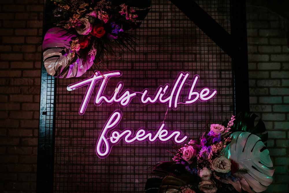 Backdrop Arch Flowers Neon Sign Wedding Ideas State Of Love and Trust Photography