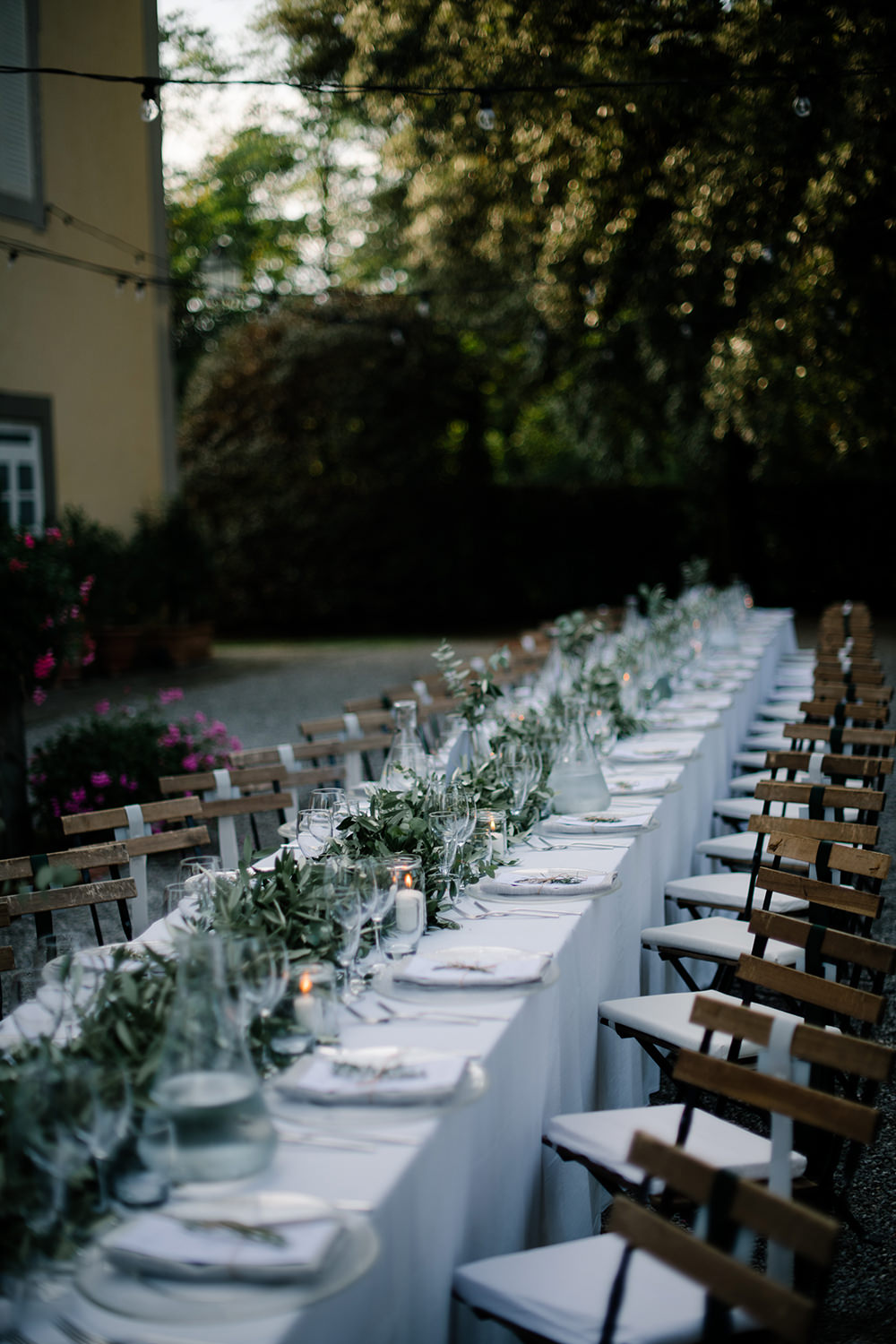 Long Tables Greenery Foliage Olive Eucalyptus Outdoor Outside Reception Tuscany Wedding Lelia Scarfiotti