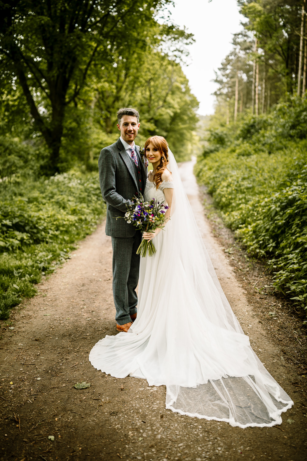 Bride Bridal Dress Gown Veil Rebecca Ingram Train Lace Groom Groomsmen Suit Grey Check Floral Tie Yorkshire Barn Wedding Hayley Baxter Photography