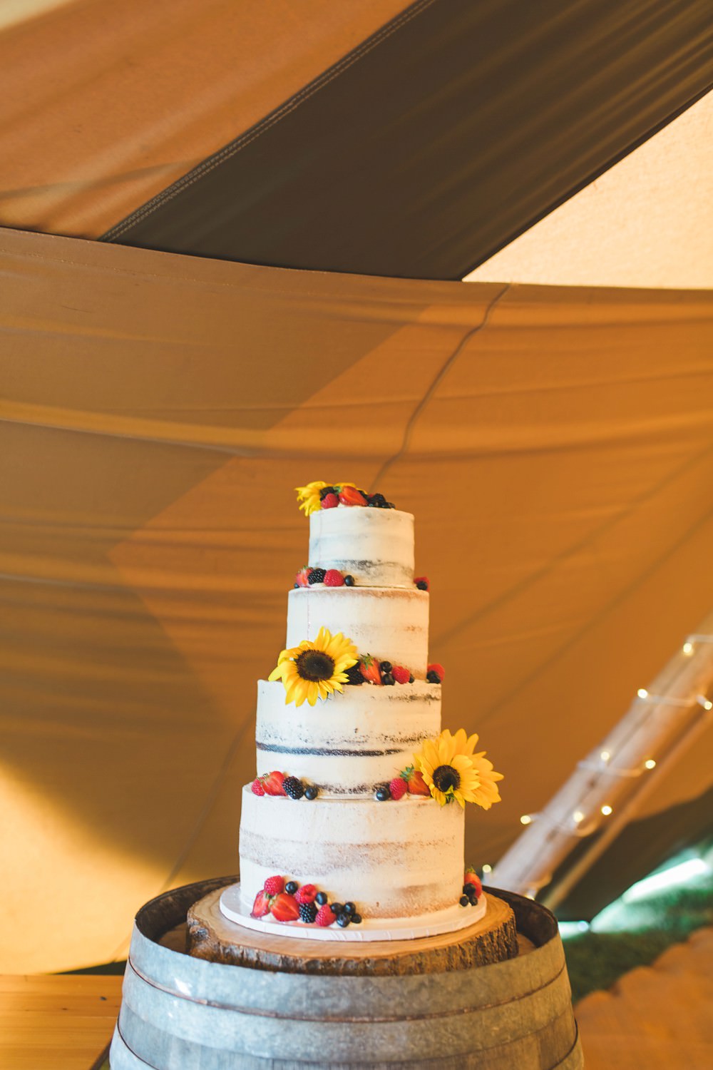 Tall Semi Naked Cake Fruit Berries Sunflowers Bedfordshire Farm Wedding Milkbottle Photography
