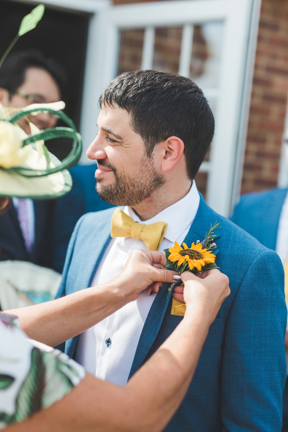 Groom Blue Suit Yellow Bow Tie Sunflower Buttonhole Bedfordshire Farm Wedding Milkbottle Photography