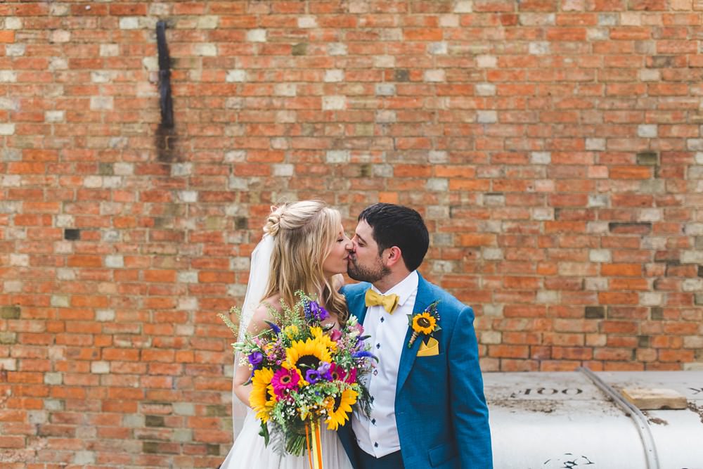 Bouquet Flowers Bride Bridal Sunflowers Yellow Ribbon Pink Gerbera Bedfordshire Farm Wedding Milkbottle Photography