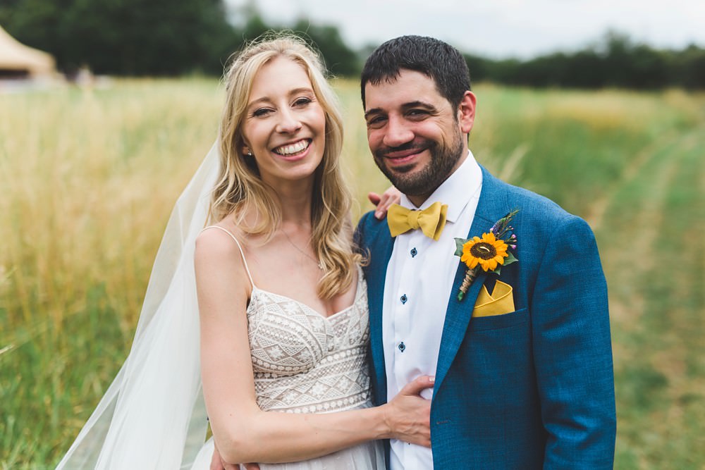 Groom Blue Suit Yellow Bow Tie Sunflower Buttonhole Bedfordshire Farm Wedding Milkbottle Photography