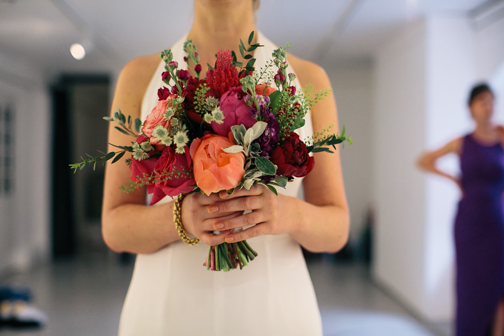 Bouquet Flowers Bride Bridal Pink Orange Peony Rose Coral Bridal Jumpsuit Wedding Emily Jarrett Photography