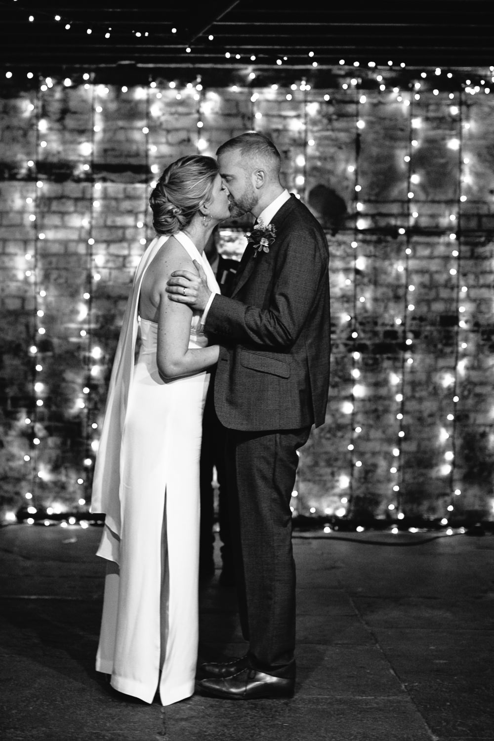 Electrician’s Shop Trinity Buoy Wharf Ceremony Fairy Lights Bridal Jumpsuit Wedding Emily Jarrett Photography
