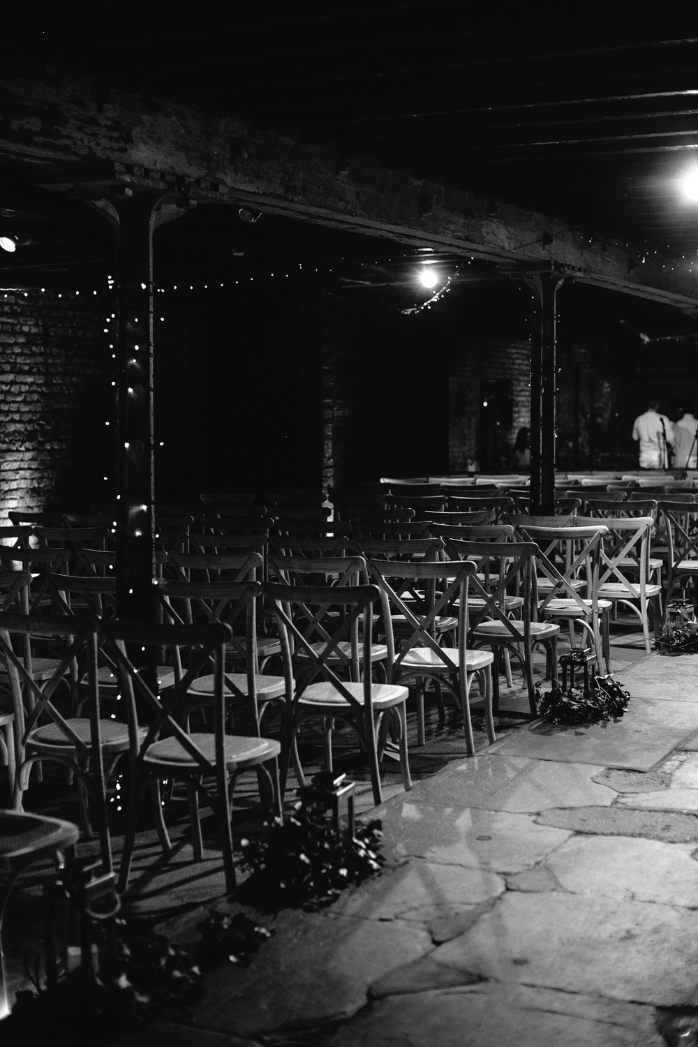 Cross Back Chairs Hurricane Candles Foliage Greenery Aisle Ceremony Bridal Jumpsuit Wedding Emily Jarrett Photography