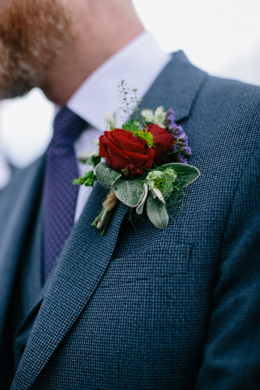 Groom Suit Navy Blue Purple Tie Rose Buttonhole Bridal Jumpsuit Wedding Emily Jarrett Photography