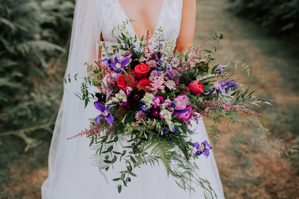 Bouquet Flowers Bride Bridal Pink Astilbe Dahlia Purple Greenery Foliage Clematis Rose Butley Priory Wedding Sally Rawlins Photography