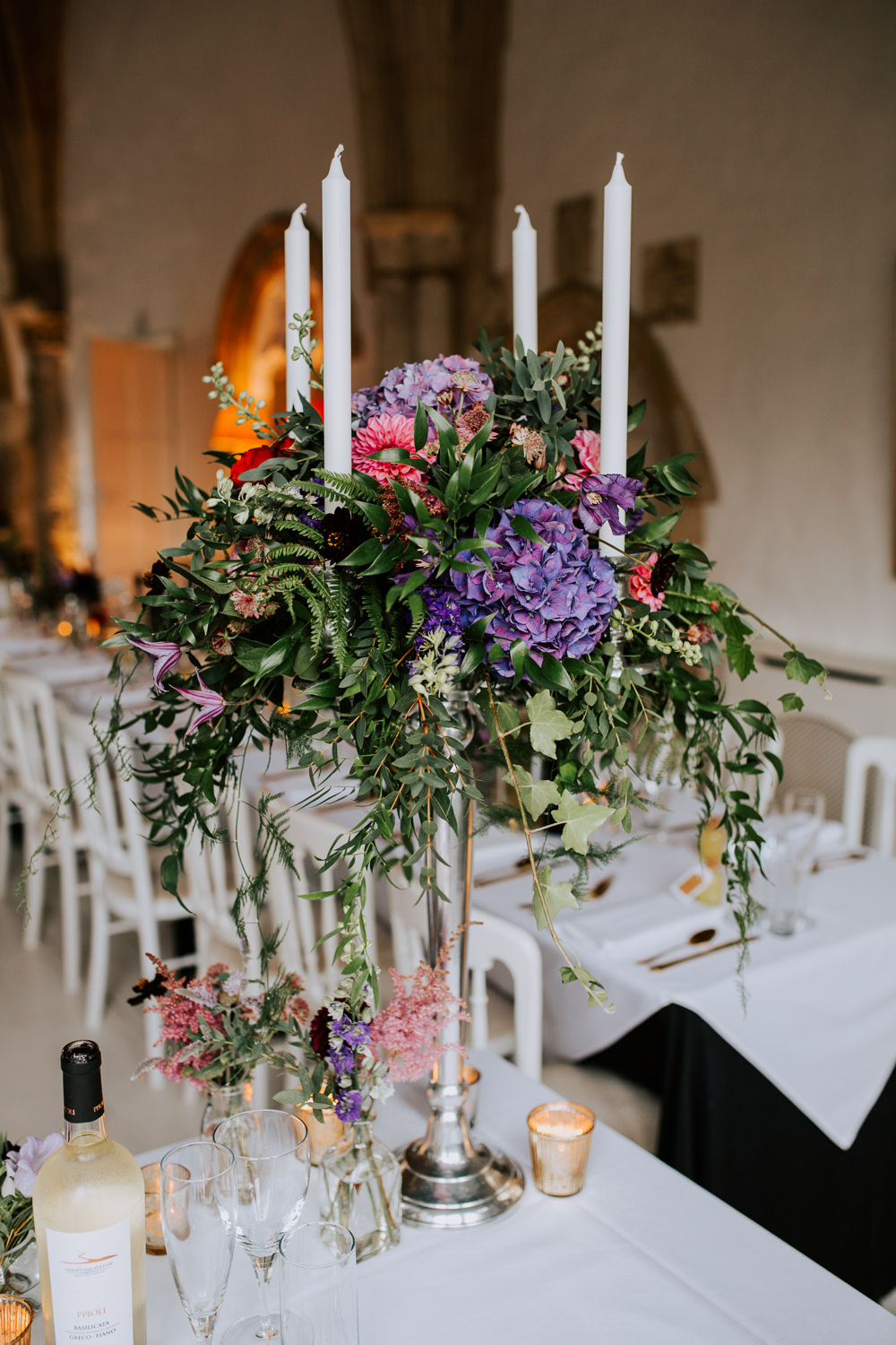 Candelabra Flowers Centrepiece Greenery Foliage Hydrangea Butley Priory Wedding Sally Rawlins Photography
