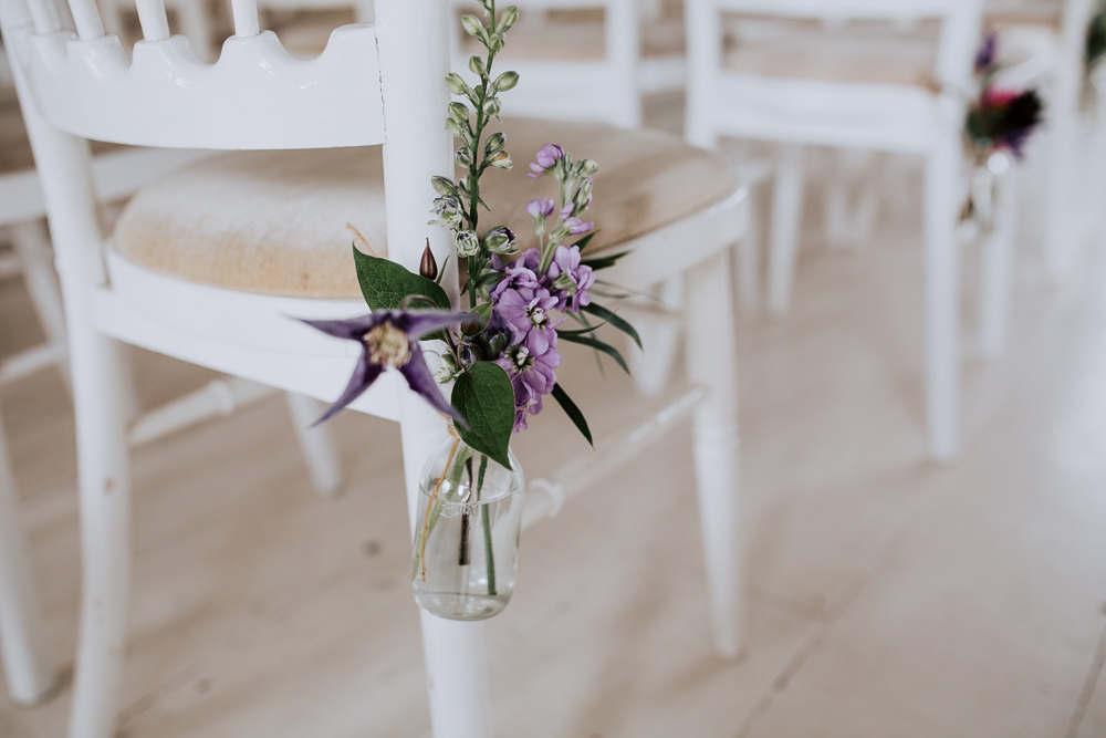 Pew End Chair Aisle Flowers Bottle Purple Lilac Butley Priory Wedding Sally Rawlins Photography