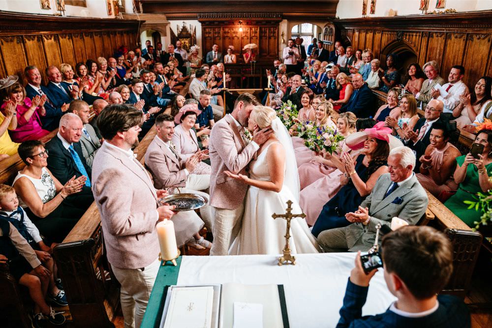 Bride Bridal V Neck Justin Alexander Dress Gown A Line Pink Salmon Custom Suit Groom Church Carousel Wedding Sarah Legge Photography