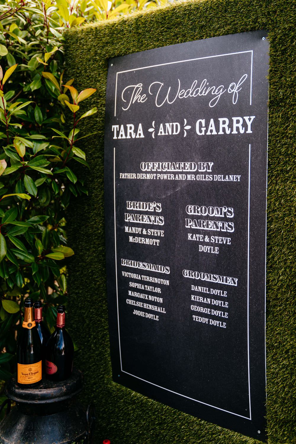 Welcome Sign Greenery Wall Chalk Board Carousel Wedding Sarah Legge Photography