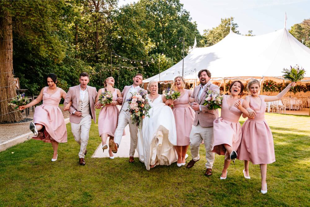 Bride Bridal V Neck Justin Alexander Dress Gown A Line Pink Salmon Custom Suit Groom Bridesmaids Groomsmen Carousel Wedding Sarah Legge Photography